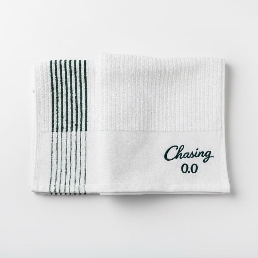 The Chasing 0.0 Caddy Towel (White/Green Stripe)